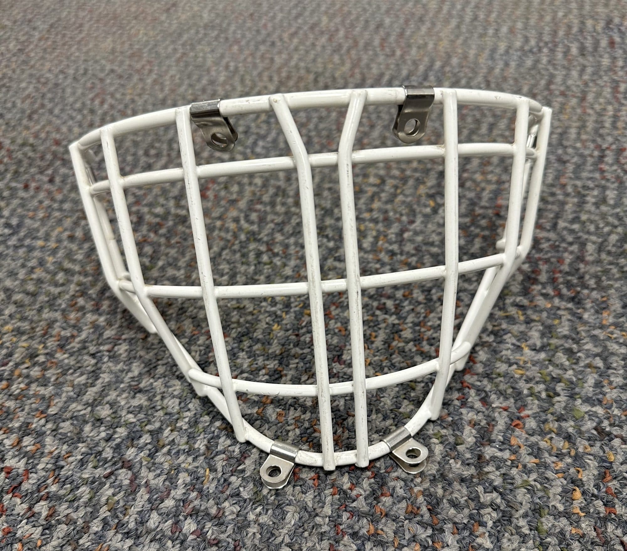 White-coated hockey goalie mask wire face cage