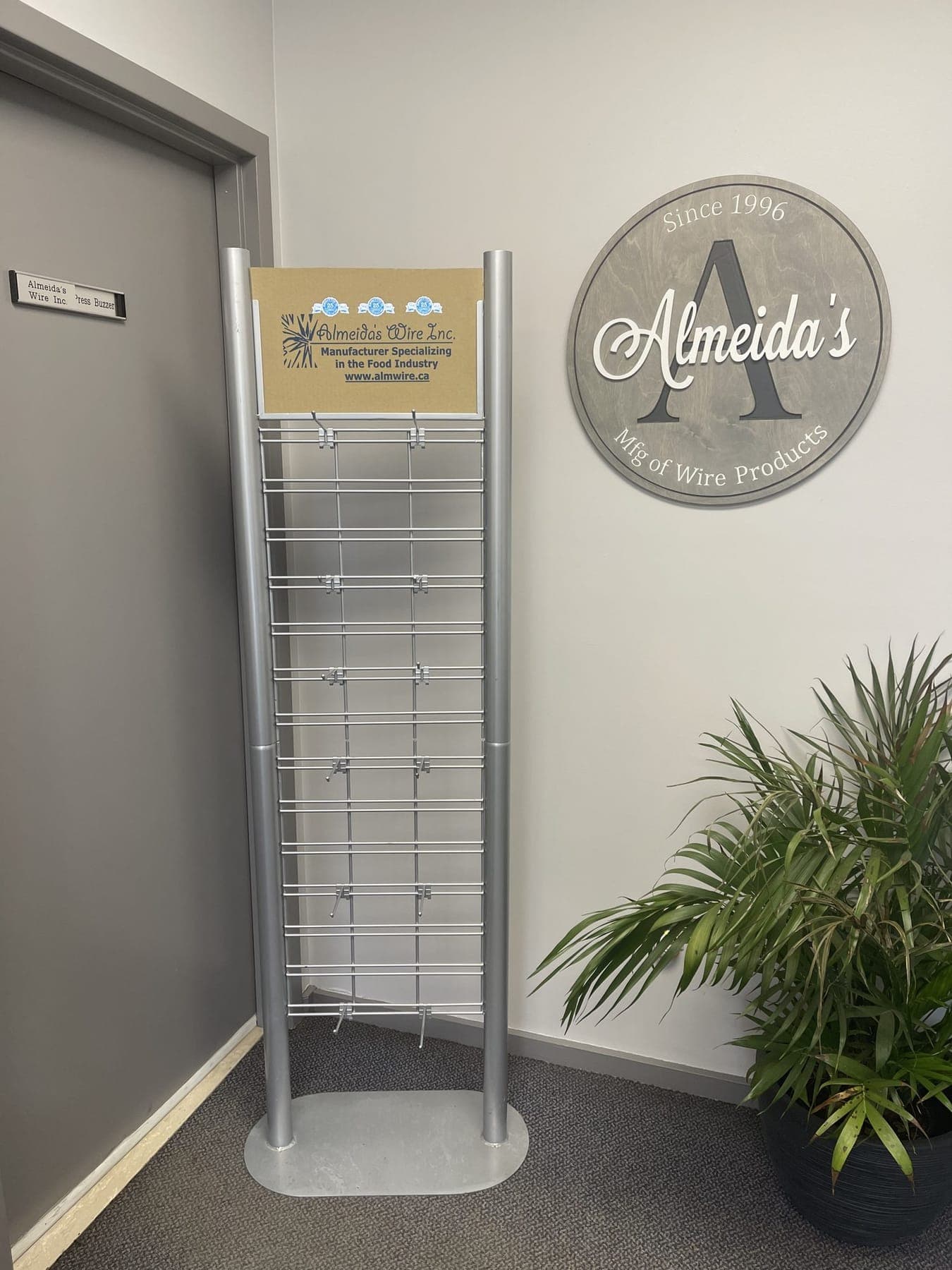 Almeida's Wire showroom with the branded company display